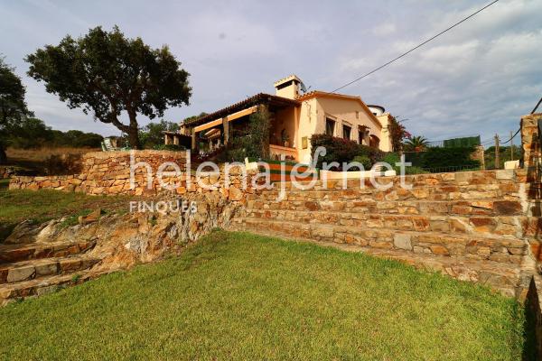 Stone house located in the Can Manel urbanization in Castell d'Aro